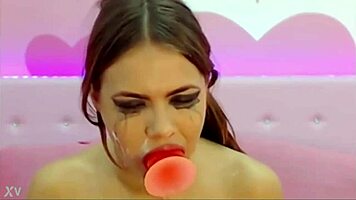 teen cam model playing sloppy with her dildo