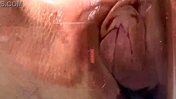 Look at this petite teen rubbing her pussy on the glass table.