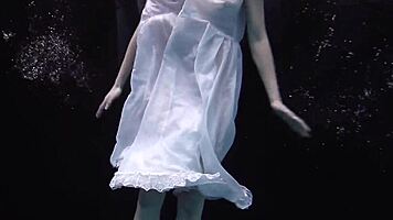 Andrejka SHOWCASES stunning UNDERWATER moves in BIKINI at BEACH pool