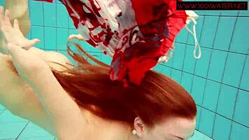 Hairy ginger Polish teen 18+ swims naked in pool underwater, showing tits in bikini