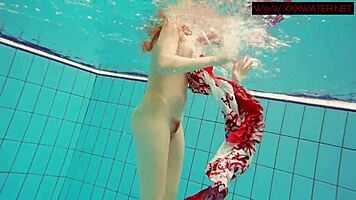 Hairy ginger Polish teen 18+ swims naked in pool underwater, showing tits in bikini