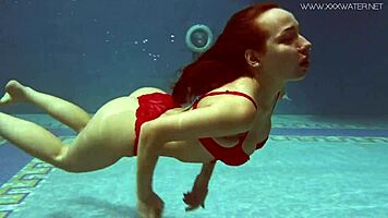 Lina Mercury shows big tits underwater in pool