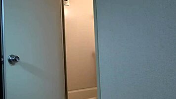 Wow, young japanese girl exposes natural tits in shower webcam!
