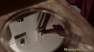 Does the stepmom strap on to fuck the teen in this lesbian threesome?