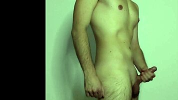 On webcam, a young amateur massages her cock to masturbation climax.