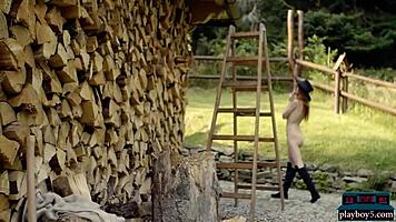 Tiny teen playboy model strips naked outdoor chopping wood!