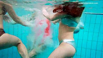 Avenna, Nina Mohnatka, and Marketa dive into steamy pool fun with bikini babes