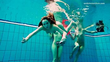 Avenna, Nina Mohnatka, and Marketa dive into steamy pool fun with bikini babes