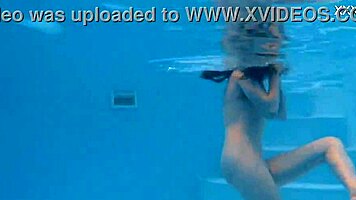 marfa, the unique and beautiful pornstar, shines by the pool with her tight body