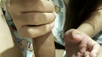 asian girl gives her boyfriend an amazing handjob