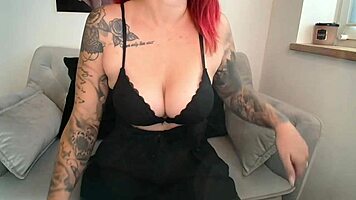 nina the redhead teen 18+ camgirl shows off her latex leggings and pierced nipples