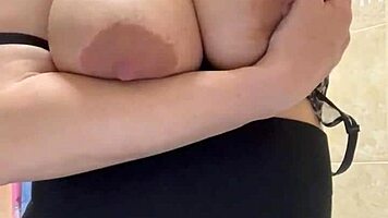 Slut Stepmom Flaunts Big Milky Tits in Steamy Shower