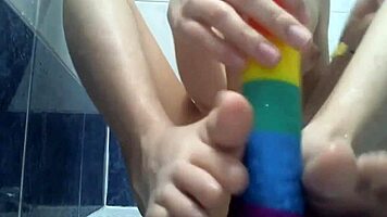 Cuntboy Xannie enjoys anal play in the shower with toys