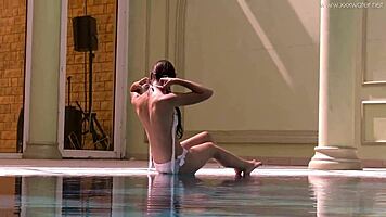 Irina's tight pussy gets wet in pool