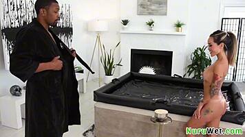 Petite Busty Asian Masseuse With Sexy Tattoos Gives Wet Nuru Massage To Black Client Isiah Maxwell