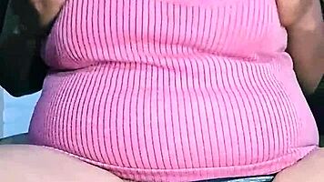 Indian housewife with natural curves relaxes at home