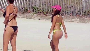 Young girl in micro bikini enjoys beach day with boyfriend's relatives