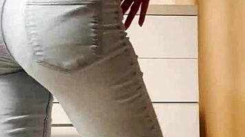 Petite Blonde Performs Seductive Striptease In Tight Jeans