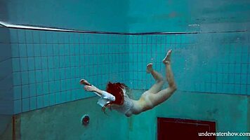 big natural tits babe lola enjoys underwater swimming in the pool