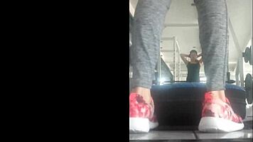 Skinny Mexican teen bent over in leggings at the gym