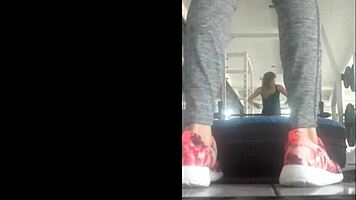 Skinny Mexican teen bent over in leggings at the gym