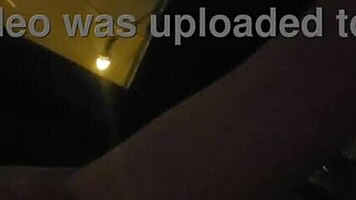 Milf masturbates in front of hotel window.