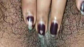 Desi housewife moans loud during close-up hairy pussy worship. Tight Asian solo action!