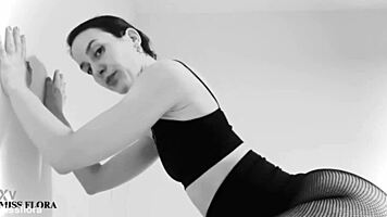 Fishnet-clad ass teases feet in black and white!