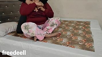 stepmom shares bed with stepson, talking dirty about big cock