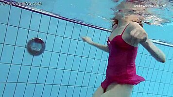 Anna netrebko teases in bikini while swimming in the pool, showing off her petite figure.