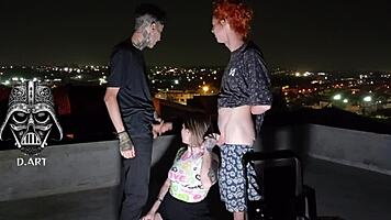 Young Girl Giving to Two Gifted Men on Roof