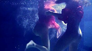 Lilia Mihalkova and Natalia Kupalka dive into intense underwater lesbian action