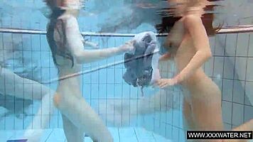 I watch shaved brunette with big tits bathing in shower