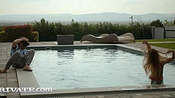 Blonde model Eveline Dellai enjoys anal sex with big cock by the pool in outdoor creampie scene