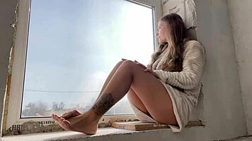 Public masturbation by the window seducing passers-by