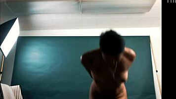 Exotic hottie spreads pussy for photographer