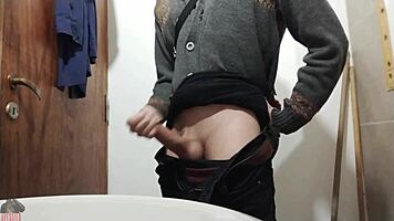 watch me masturbate my big cock in the bathroom