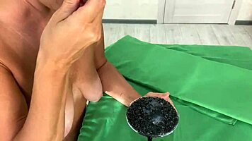 Tell me, how does this mature woman milk her partner's balls?