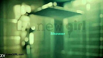 Smoldering brunette beauty enjoys a relaxing shower