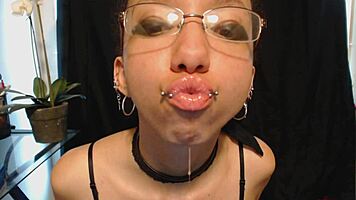 Goth Girl Applies Lipstick and Drools Playfully