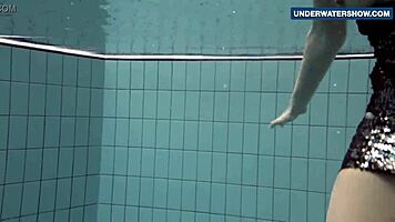 Flashing those bright tits underwater gets everyone so horny!