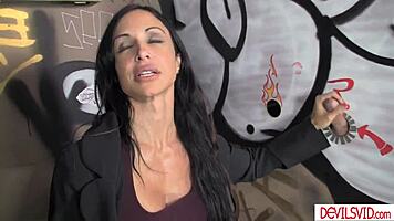 Busty milf and petite young sucking monster cock in public toilet