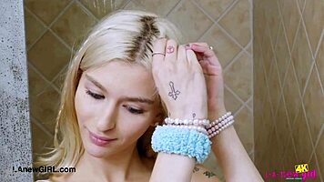 Picture-Perfect Blonde Enjoys Relaxing Shower