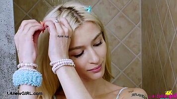 Picture-Perfect Blonde Enjoys Relaxing Shower