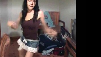 thai ladyboy dances in jean skirt revealing big tits while stripping and blowing cock