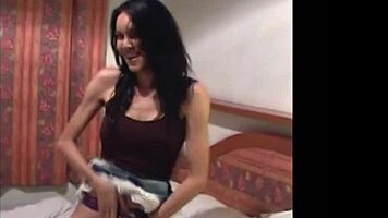 thai ladyboy dances in jean skirt revealing big tits while stripping and blowing cock