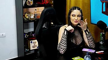 Victoria Camargo Bent Over on Podcast Table