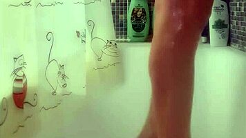 Busty 18+ European Teen Carefully Washes Her Perfect Feet In The Shower, Exposing Big Tits