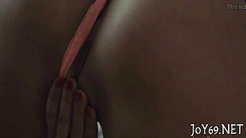 Intensely aroused solo babe fingers wet pussy with dildo