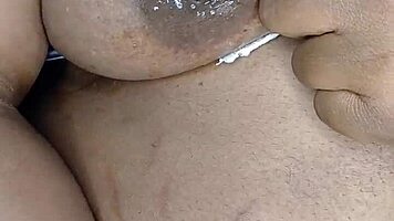 Is this ebony woman masturbating in her room alone?